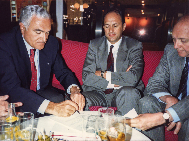 Romano Artioli, the CEO of SNECMA Jean-Paul Béchat and Gérard Fouilloux in the Sofitel Hotel in Paris, signing the legal documents to take over full ownership and control of the Bugatti marque